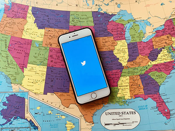 Map of the U.S. with a Twitter icon on top.