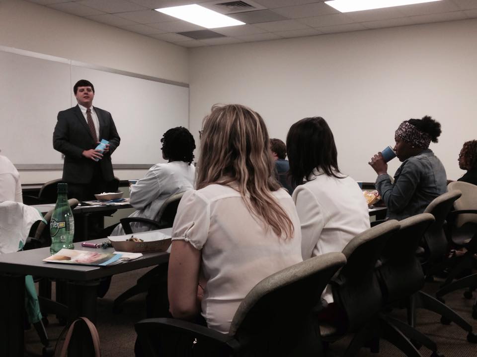 professionals speaking to students