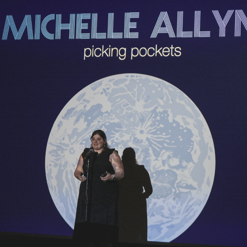 Michelle Allyne performing "Picking Pockets" at the 2022 Take back the Night