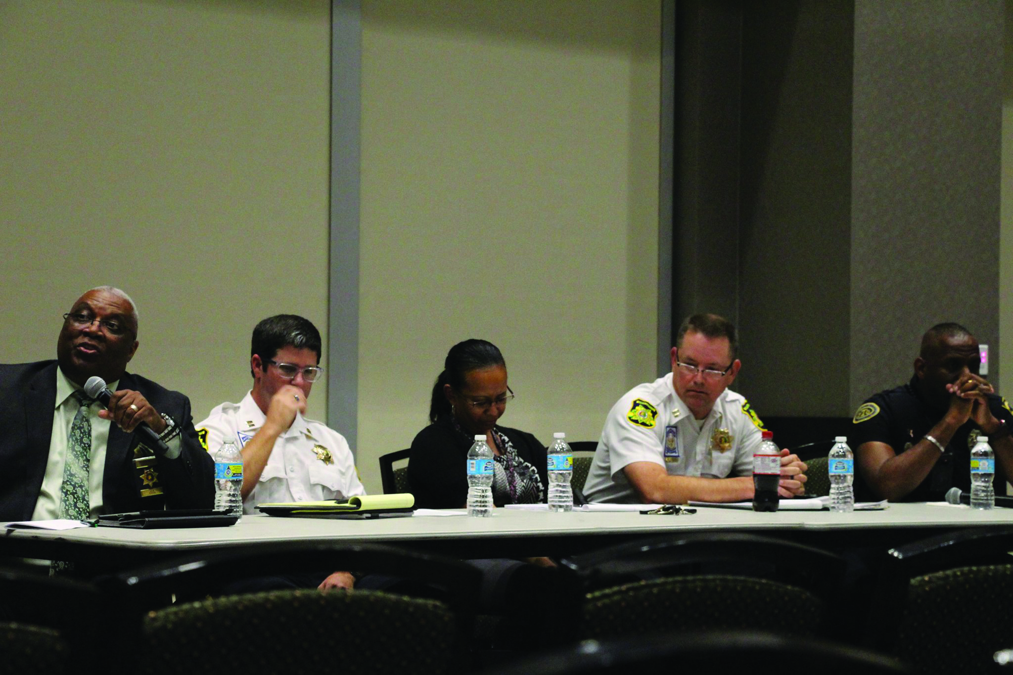 Four members of the UABPD and one Birmingham City Police officer [not pictured] answer questions about issues and finding solutions to the national tension between officers and African-Americans.  Photo by Marika Gray