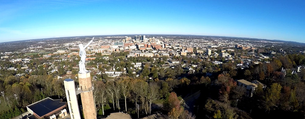Aerial image of Vulcan with Birmingham skyline in the background.