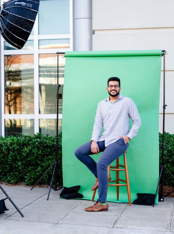 Photo of Viral Patel against green backdrop and photo lights