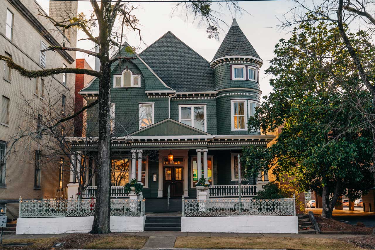 Exterior of UAB ArtPlay House at sunset.