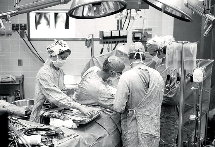 Photo: John Kirklin, M.D., in surgery