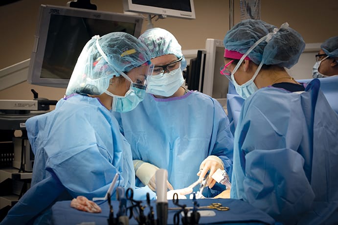 Jayme Locke, M.D., performing a kidney transplant.