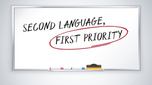 Illustration of whiteboard with headline: Second Language, First Priority