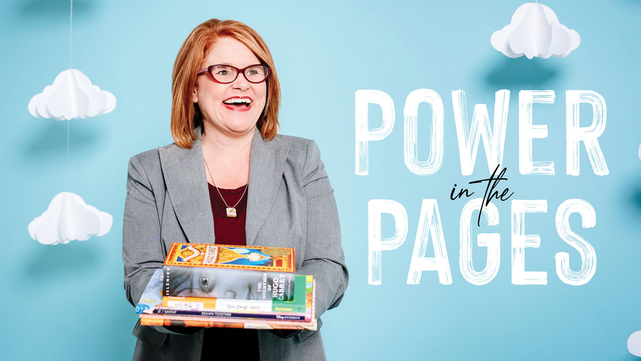 Photo ofJennifer Summerlin holding books in front of blue background with paper clouds; headline: Power in the Pages