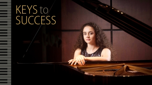 Photo of Alexsandra Kasman at piano