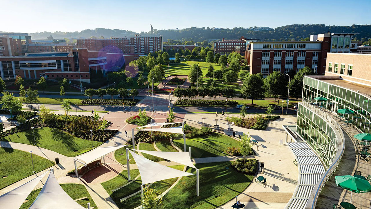 Photo: TThe Campus Recreation Center, several residence halls, University Hall and Heritage Hall can be seen surrounding the Campus Green from the top of the Hill Student Center, which features an outdoor amphitheater in its front yard. Bonus: Vulcan standing in the distance.